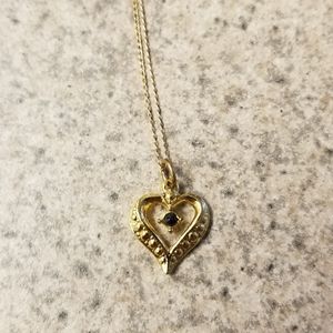 Small heart pendant on fine 14kt gold chain